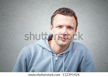 Young man wears casual sport clothes. Outdoor photo Royalty-Free Stock Photo #112391426