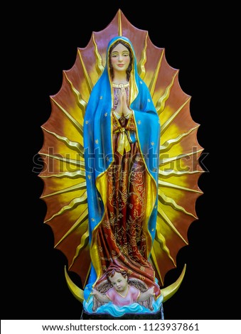 Our Lady Guadalupe statue 
 Royalty-Free Stock Photo #1123937861