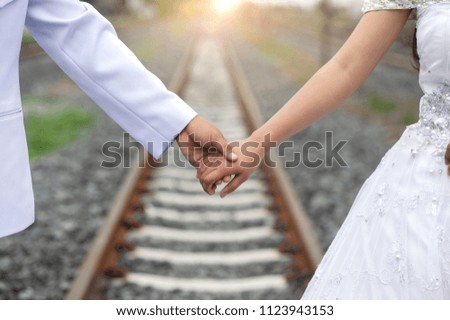 Married couple walking hand in hand Pre-Wedding