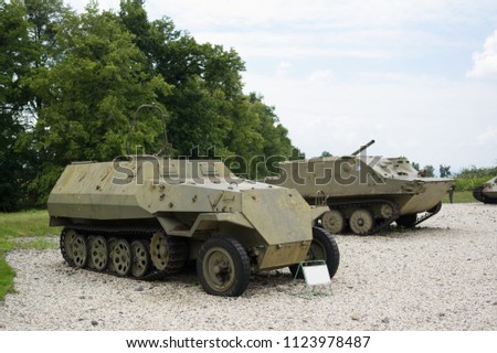 Armored fighting and personnel carrier vehicle - Czechoslovak military vehicle based on german half-track machine from second world war.  Royalty-Free Stock Photo #1123978487