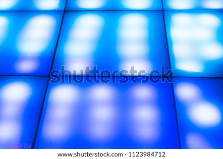 Glitter colored light bokeh circles abstract background.