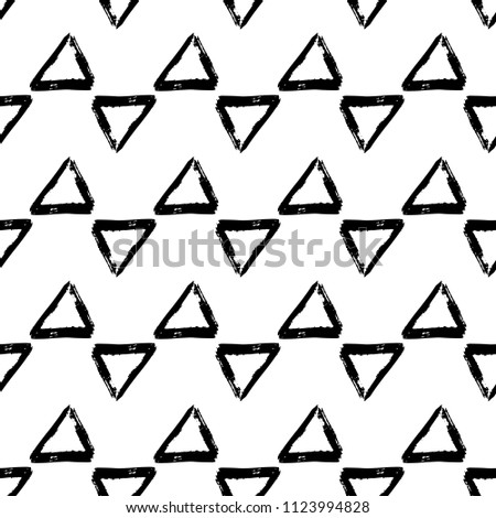 Vector seamless pattern with brush triangle and strokes. Black color on white background. Hand painted grange texture. Ink geometric elements. Fashion modern style. Endless fabric print.