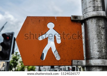Orange street sign