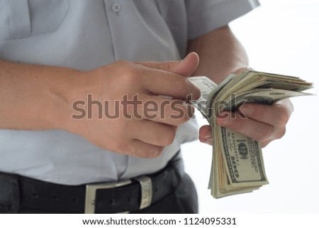 man is counting american dollars