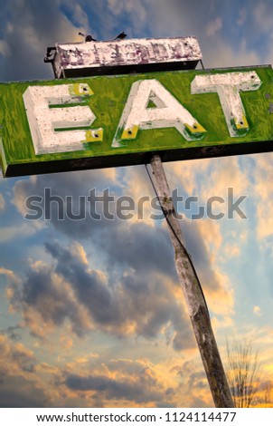 The old attraction sign of an abandoned eatery on Route 66.