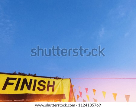 Finish label with blue sky background, running achievements finisher, marathon concept