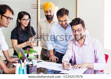 Indian business team working together in office