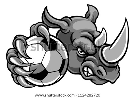 A rhino soccer animal sports mascot holding a football ball
