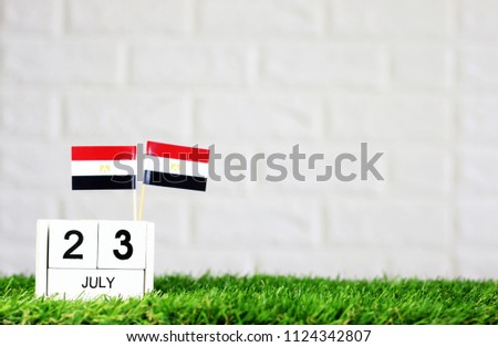 July 23 Wooden calendar and Egypt Flag Concept Egypt national day with space for your text
