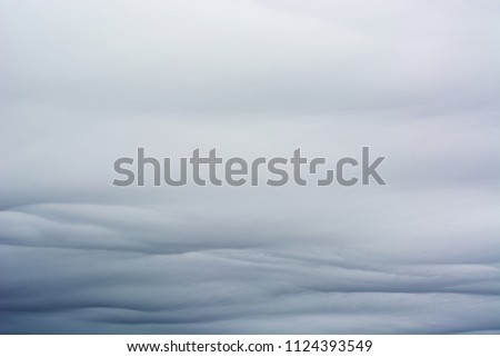 Texture of gray and blue clouds in cloudy weather. Natural background