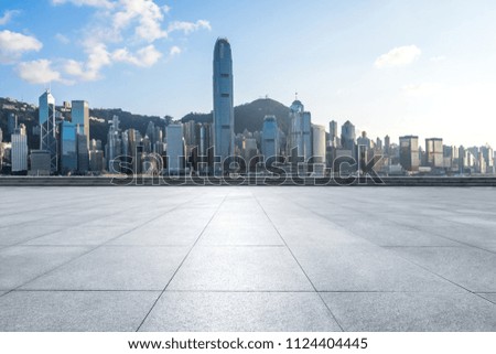 empty square with city skyline in hong kong china