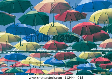 Creative background with umbrellas 