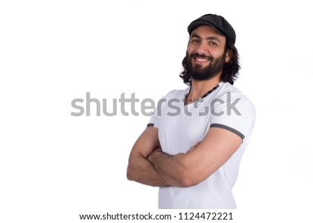 Portrait of a handsome man wearing casual outfit and cup standing crossed arms and smiling, isolated on white background