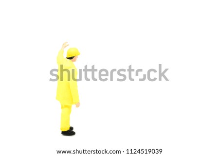 Miniature people engineer worker construction concept on white background with a space for text