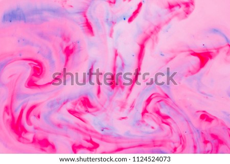 Abstract pink blue background on liquid, texture with paints, multicolored pattern for designer, abstract pattern from food dyes on milk, blank for designer, art
