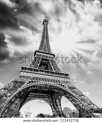 Dramatic view of Eiffel Tower with Sky on Background, Paris