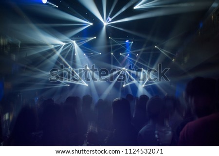 Celebrate, Christmas , New Year Party Concept for Background. Light Show  in Concert Club Night in Holiday. 