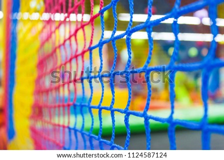 Beautiful bright colorful mesh close-up. Enclosure of the site