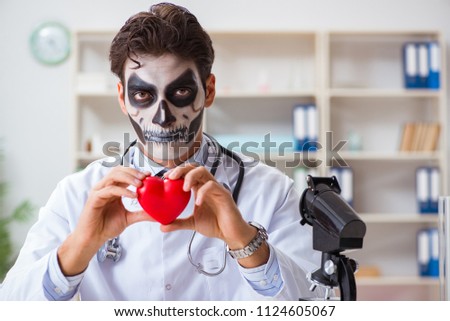 Scary monster doctor working in lab Royalty-Free Stock Photo #1124605067