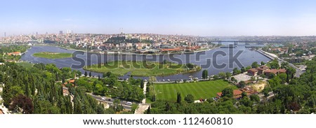 Panoramic view of Golden Horn from Eyup-Pierre Loti Point in Istanbul city, Turkey Royalty-Free Stock Photo #112460810
