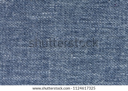 Elegant textile background in ideal light blue tone. High resolution photo.
