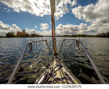 This picture was taken from a boat floating in a lake in Lituania.