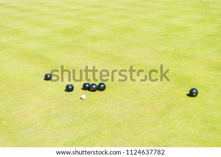 Men playing bowls at the bowling club  Greate Yarmouth, England. Bowls Tournaments in Greater Yarmouth.The bowling green.