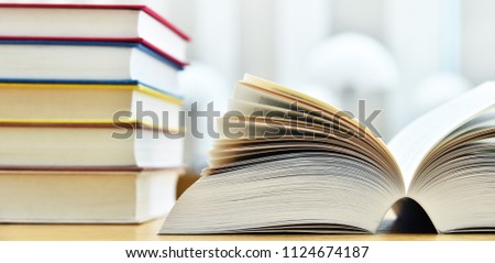 Books lying on the table in the public library.