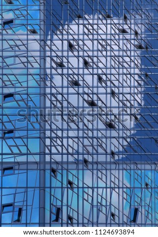 Transparent architecture of glass office skyscrapers. Double exposure photo of modern buildings. Abstract business cityscape background with sky reflection.