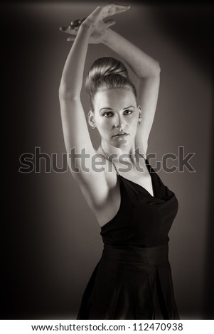 Female Model Doing A Ballet Pose in Black and White