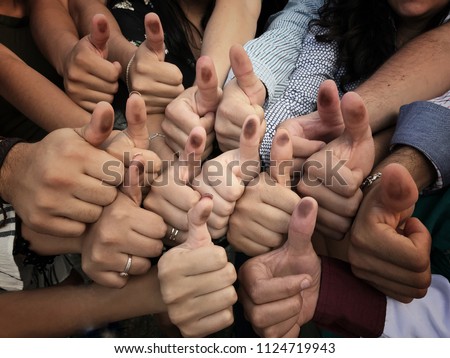 thumbs up with ink, elections, voting for mayor, president senator, deputies Royalty-Free Stock Photo #1124719943