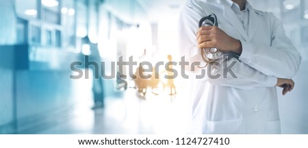 Healthcare and medical concept. Medicine doctor with stethoscope in hand and Patients come to the hospital background. Royalty-Free Stock Photo #1124727410