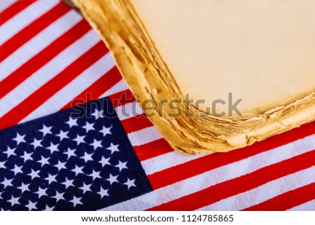 American flag wooden background.The Flag Of The United States Of America. The an old book form template.