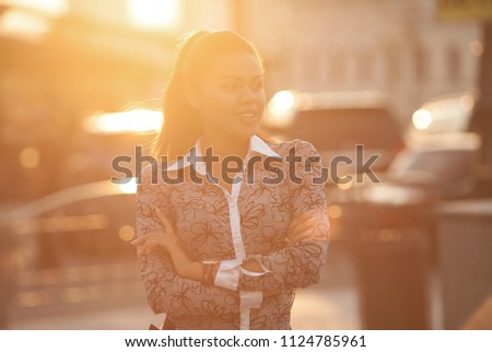 Close up portrait of a beautiful african american woman smiling with sunset