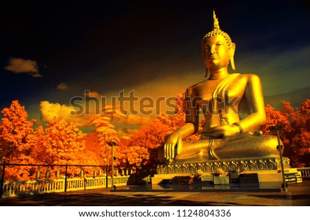 Big Golden Buddha Statue in thai temple from near infared style by IR mode.Paradise concept.              