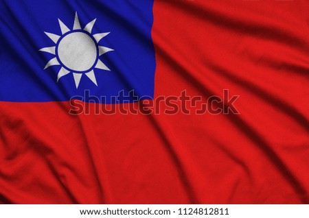 Taiwan flag  is depicted on a sports cloth fabric with many folds. Sport team banner