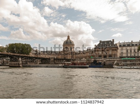 Views of the Palace of La Conciergerie in Paris from the Seine river