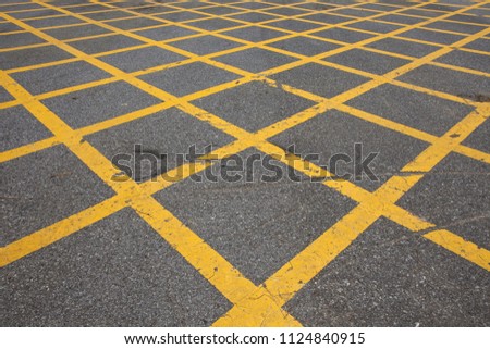 No parking yellow cross zone background