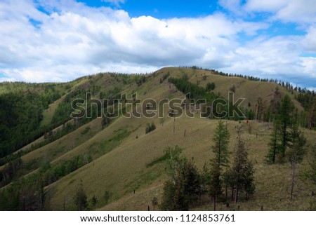 Scenic panoramic view of Kraka mountain range, South Ural, Bashkiria, Russia