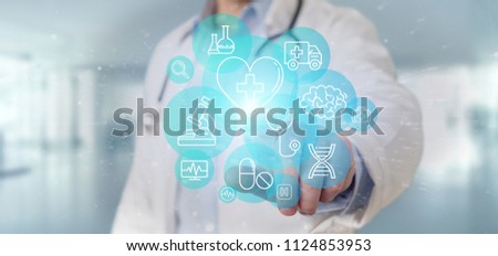 View of a Businessman holding Medical icon and connection 3d rendering