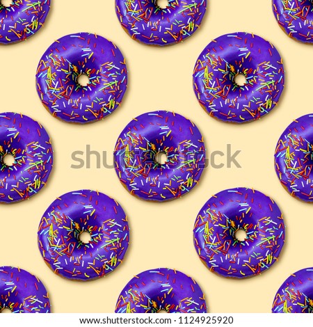 Bright flat seamless pattern with donuts. Violet glazed donuts with colorful sugar sprinkles on yellow background. Fashion minimalism style. Top view