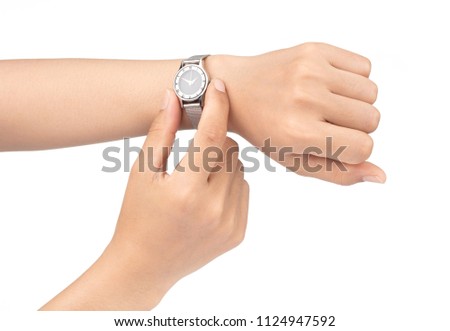 Wristwatch on the hand isolated on white background.

