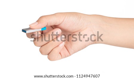 hand holding USB flash memory isolated on a white background. 