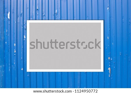Blue metal fence background. Photo Frame Mock Up. Empty space for text design and message 
