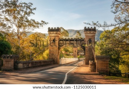 Kangaroo Valley, New South Wales, Australia -October 5, 2015: Hampden Bridge is a historic suspension bridge across the Kangaroo River and a heritage Victorian attraction in Southern Highlands.