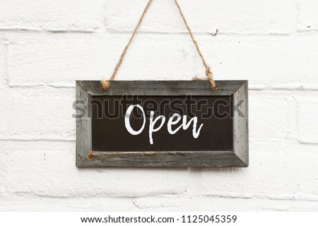 Chalkboard text welcome come in we’re open