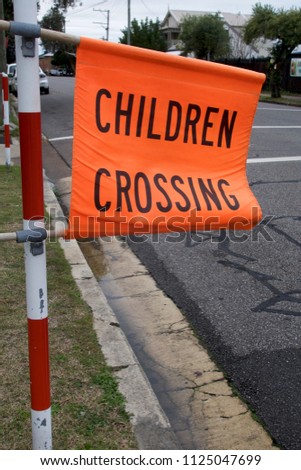 Children crossing sign outside a school in Newcastle, NSW, Australia