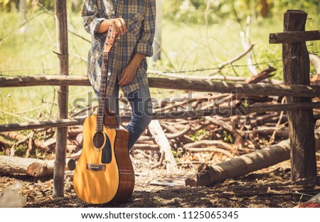 Young girl and guitar