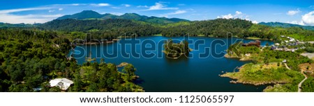 Panoramic Aerial View of Blue Lake Patenggang with an Islet in the Middle of the Lake, Ciwidey, Bandung, West Java, Indonesia, Asia Royalty-Free Stock Photo #1125065597