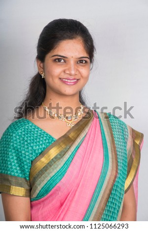 Beautiful Indian girl in traditional Indian sari.